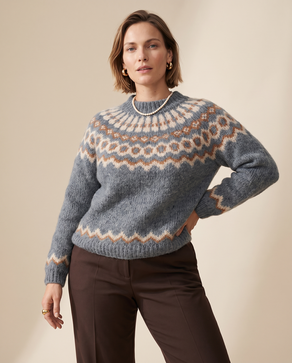 Fair Isle Yoke Sweater — worn by a model against a soft oat-beige studio backdrop