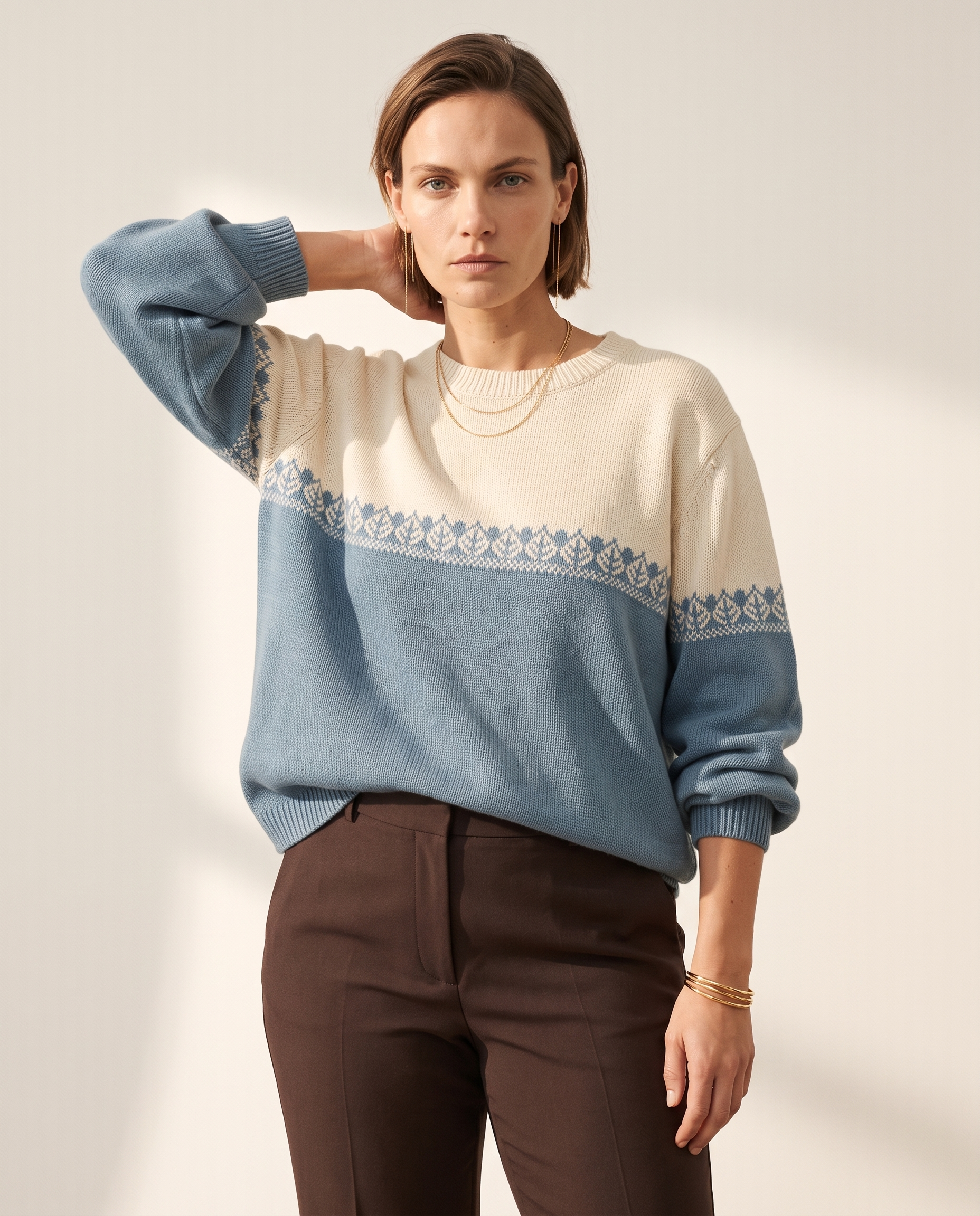 Colourblock Nordic Sweater — worn by a model against a warm off-white studio backdrop