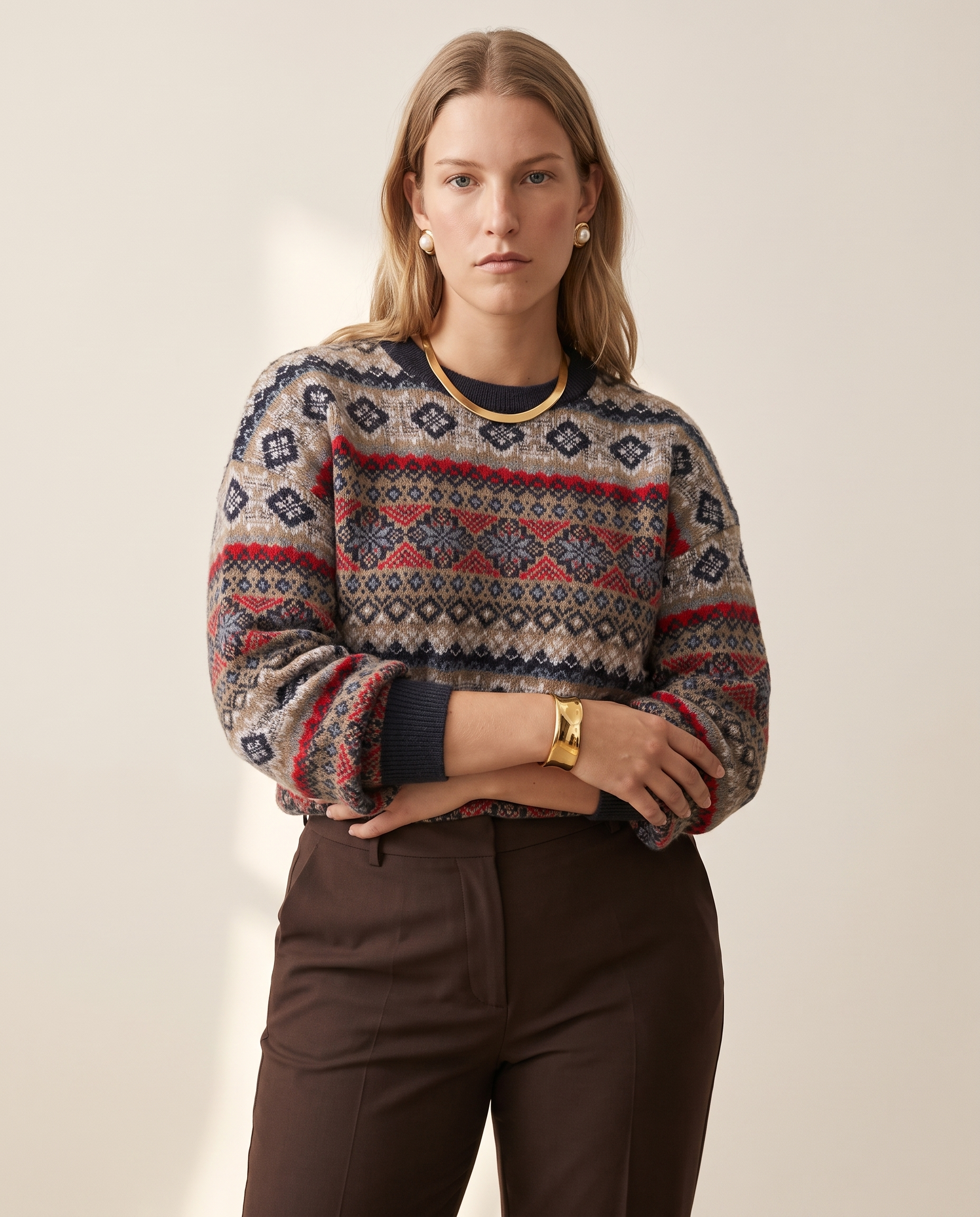 Folk Fair Isle Sweater — worn by a model against a warm off-white studio backdrop