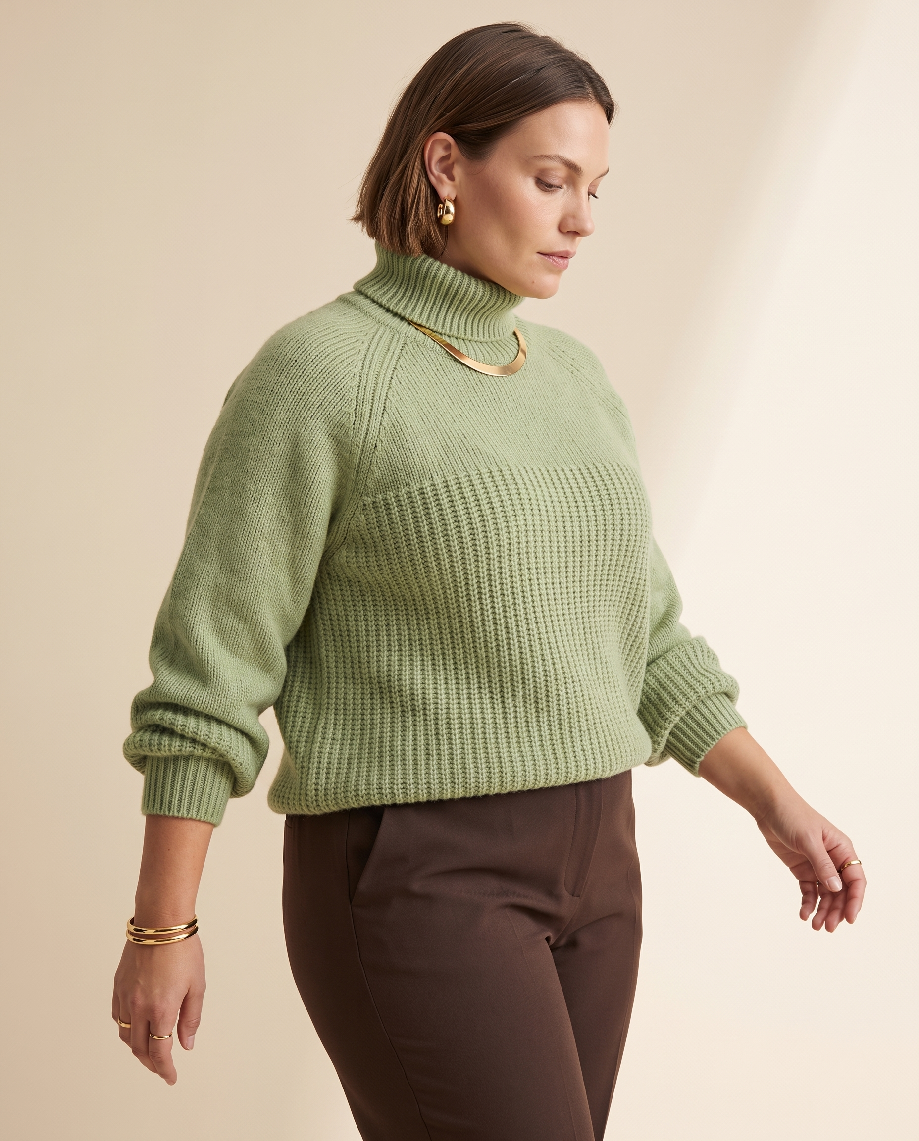 Raglan Collar Knit — worn by a model against a pale sand studio backdrop