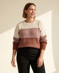 Rose Colourblock Sweater — worn by a model against a warm ivory studio backdrop