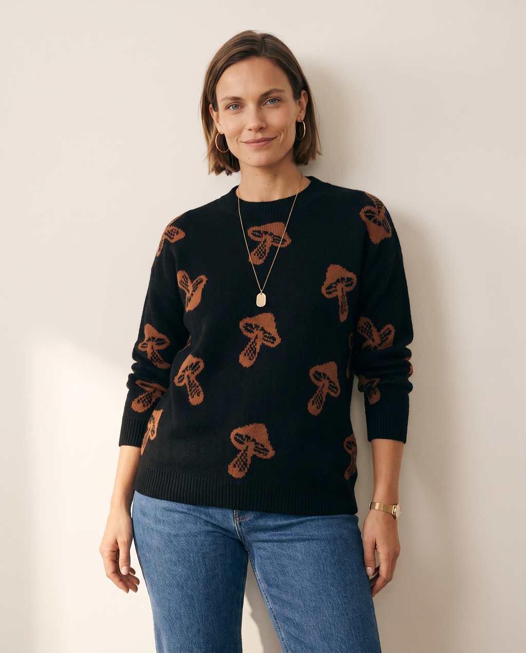 Jacquard Pullover — worn by a model against a warm off-white studio backdrop