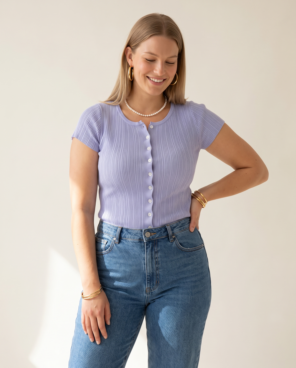 Ribbed Button Top — worn by a model against a warm off-white studio backdrop