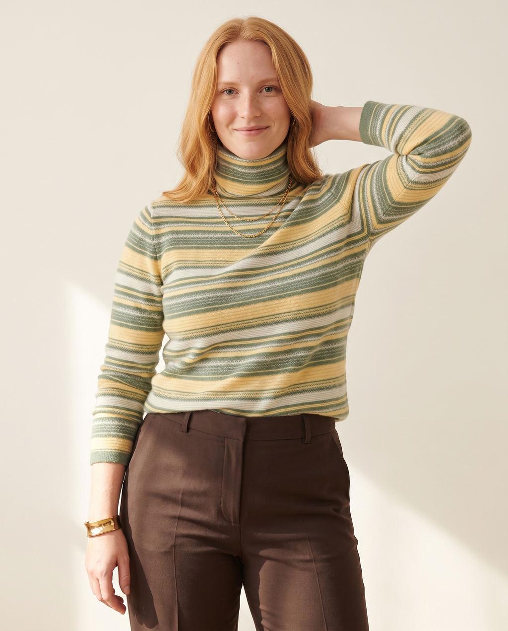 Stripe Roll Neck — worn by a model against a warm off-white studio backdrop