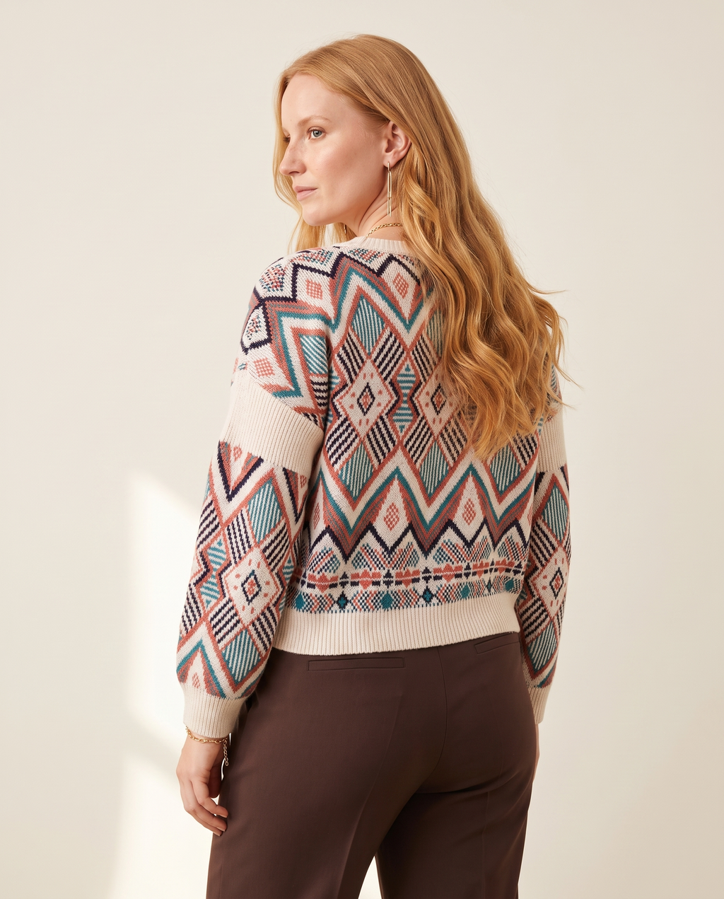 Diamond Jacquard Sweater — back view, on a warm off-white studio backdrop