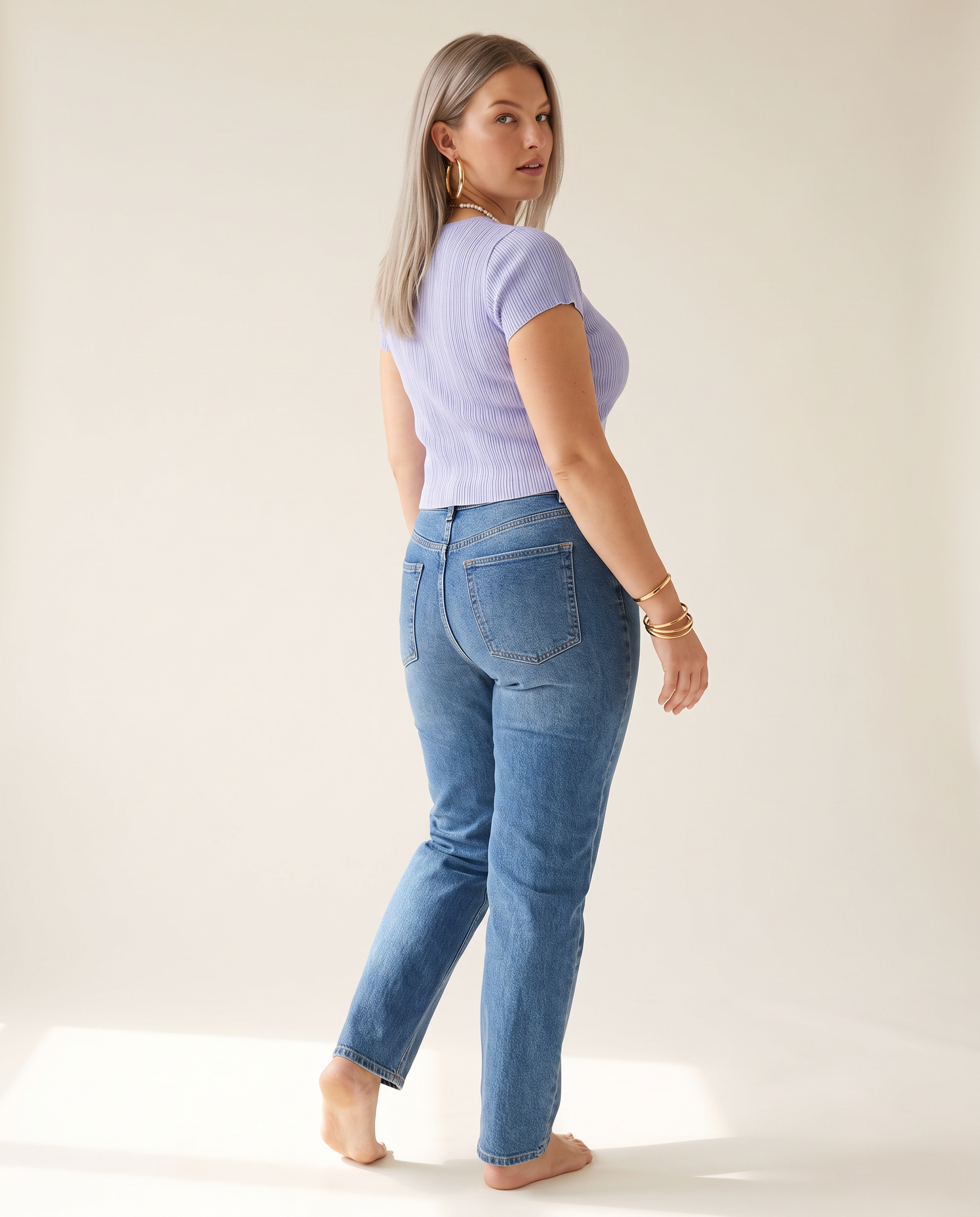 Ribbed Button Top — back view, on a warm off-white studio backdrop