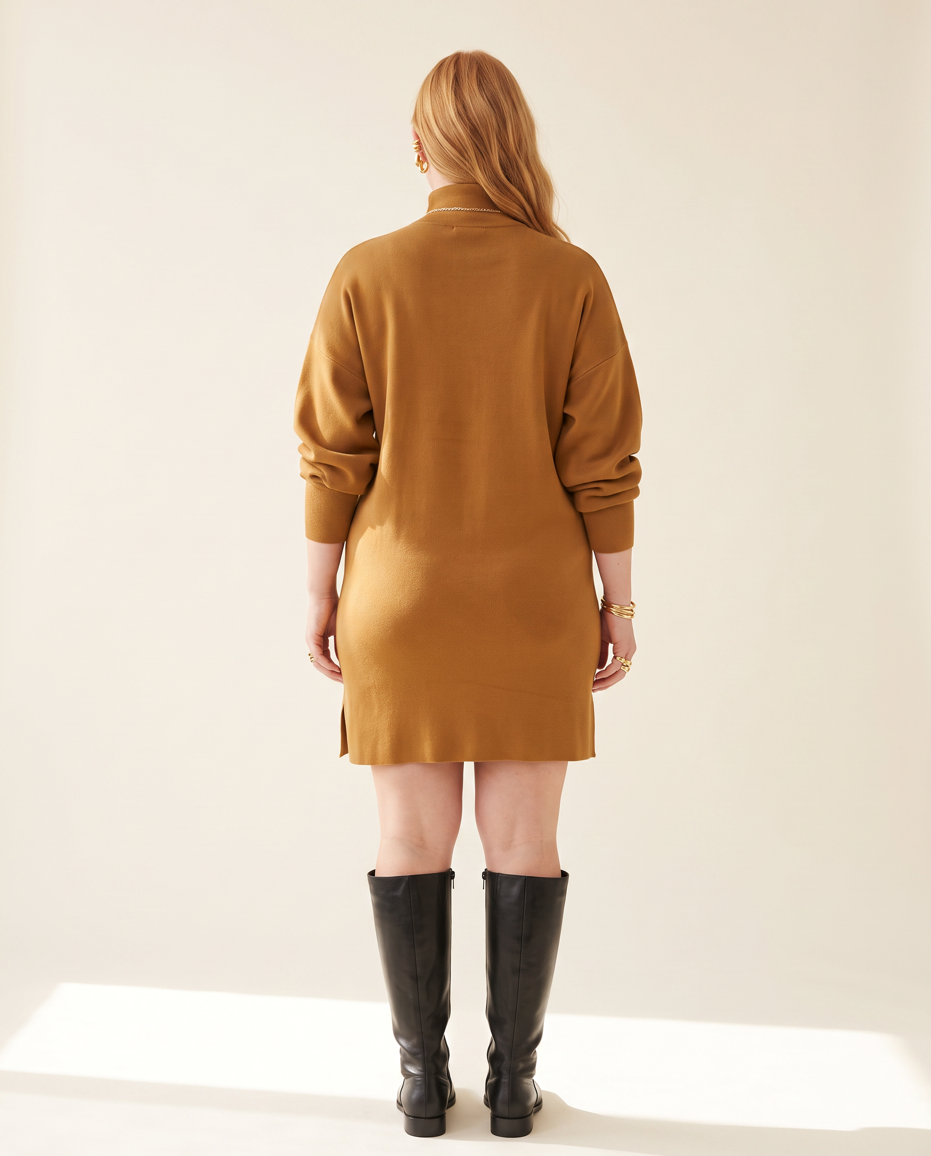 Split Hem Turtleneck Dress — back view, on a warm ivory studio backdrop
