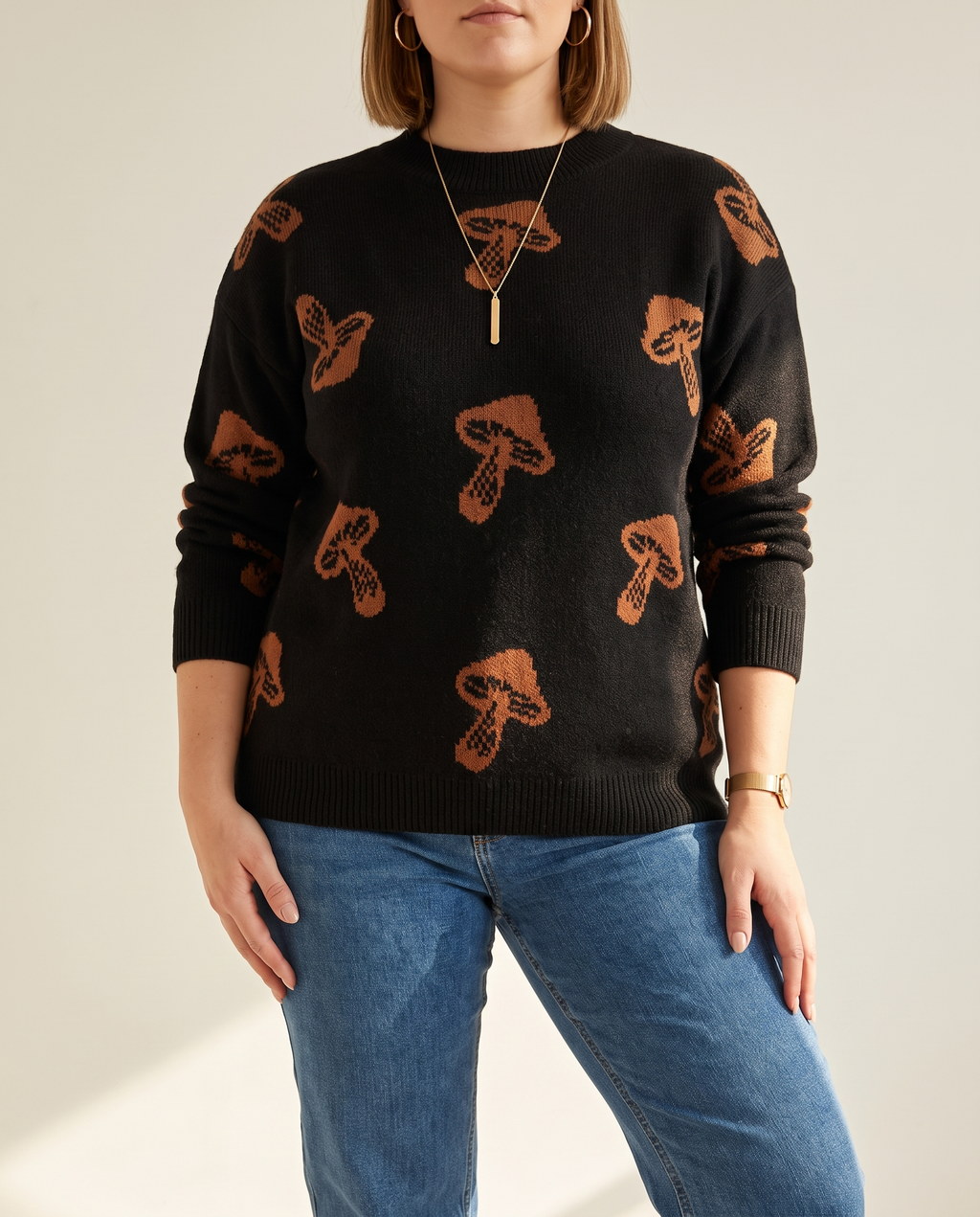 Jacquard Pullover — knit detail, on a warm off-white studio backdrop