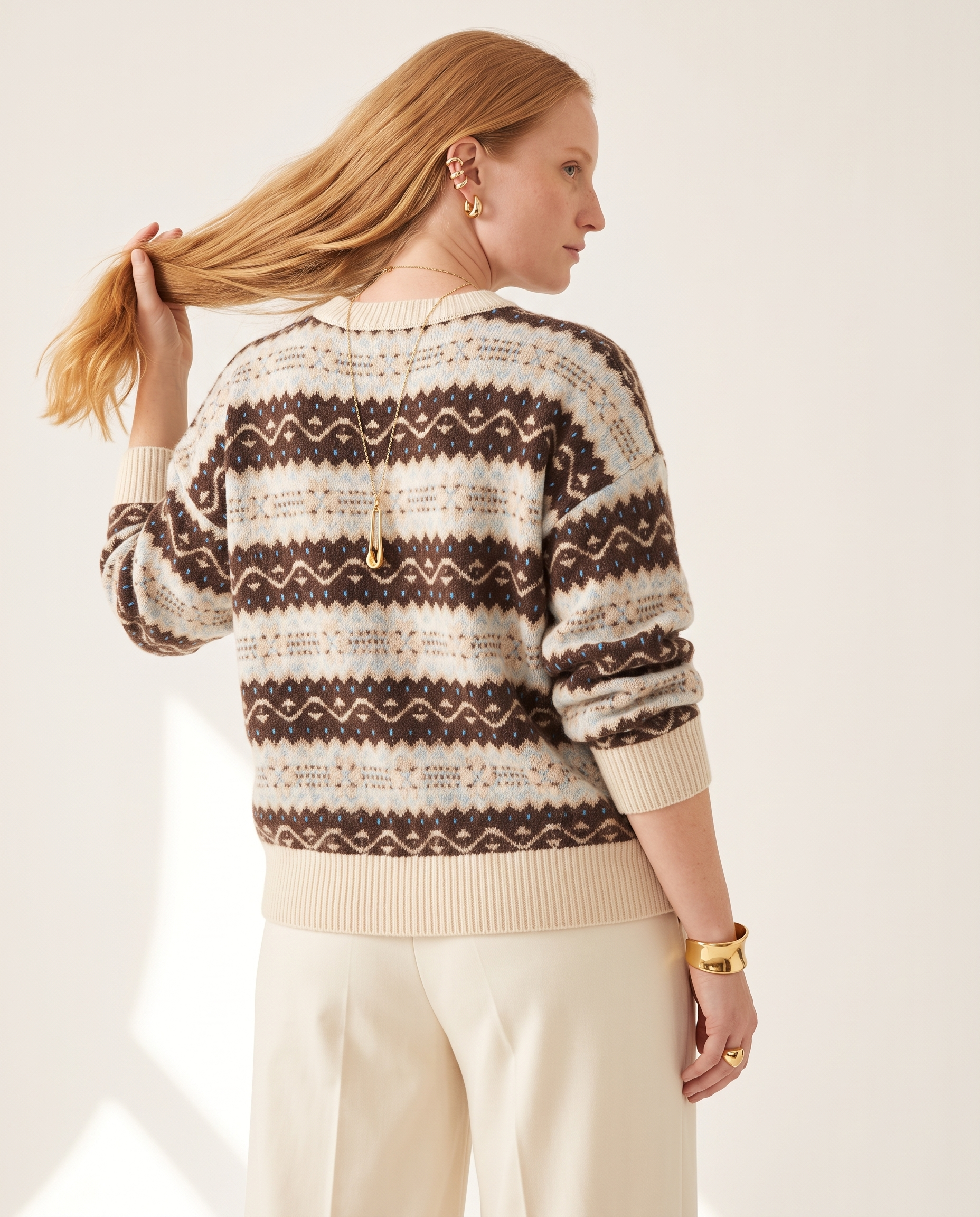 Cloud Knit Crewneck — back view, on a soft off-white studio backdrop