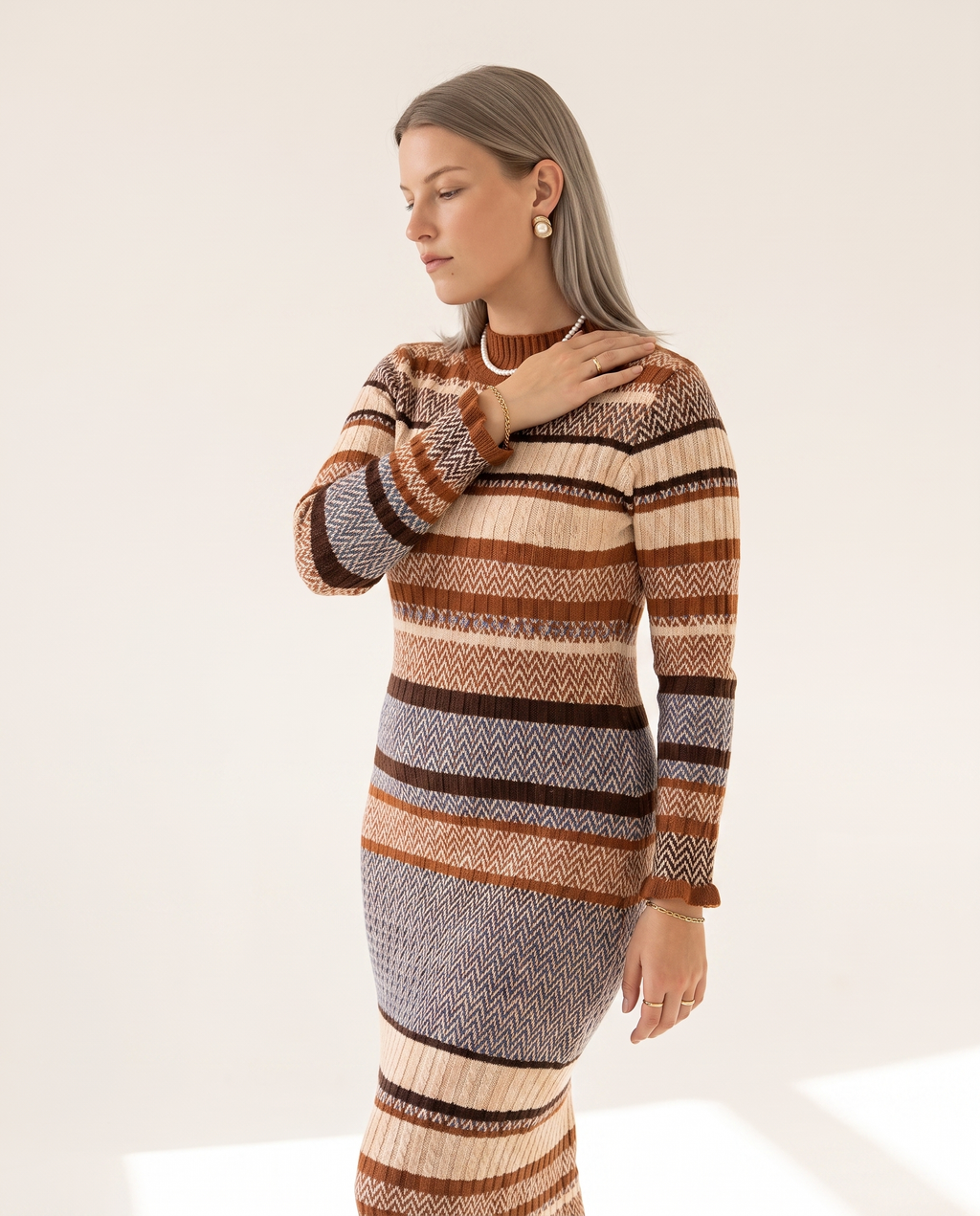 Colourblock Knit Dress — three-quarter view, on a soft off-white studio backdrop