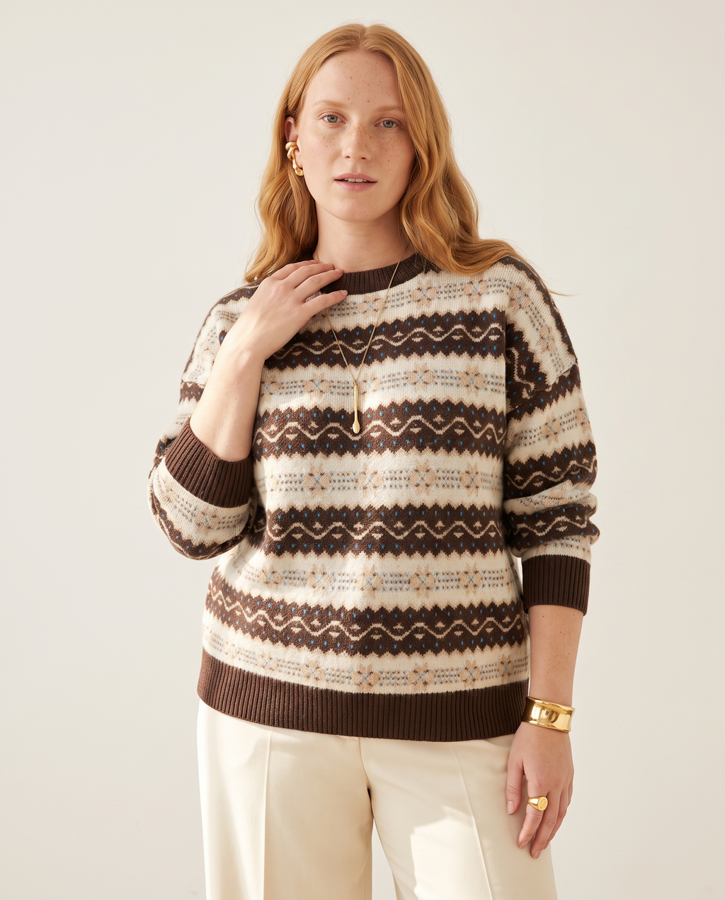 Cloud Knit Crewneck — three-quarter view, on a soft off-white studio backdrop