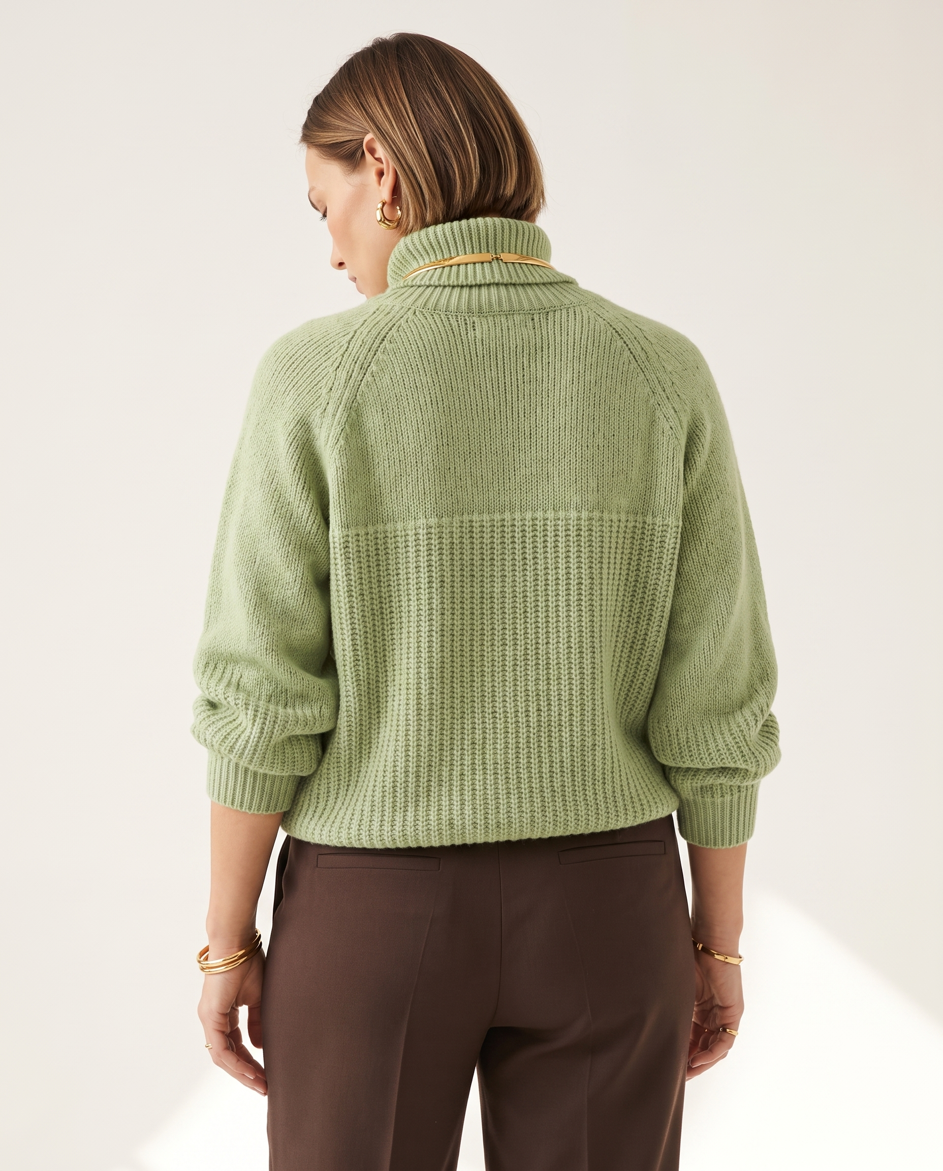 Raglan Collar Knit — back view, on a soft off-white studio backdrop
