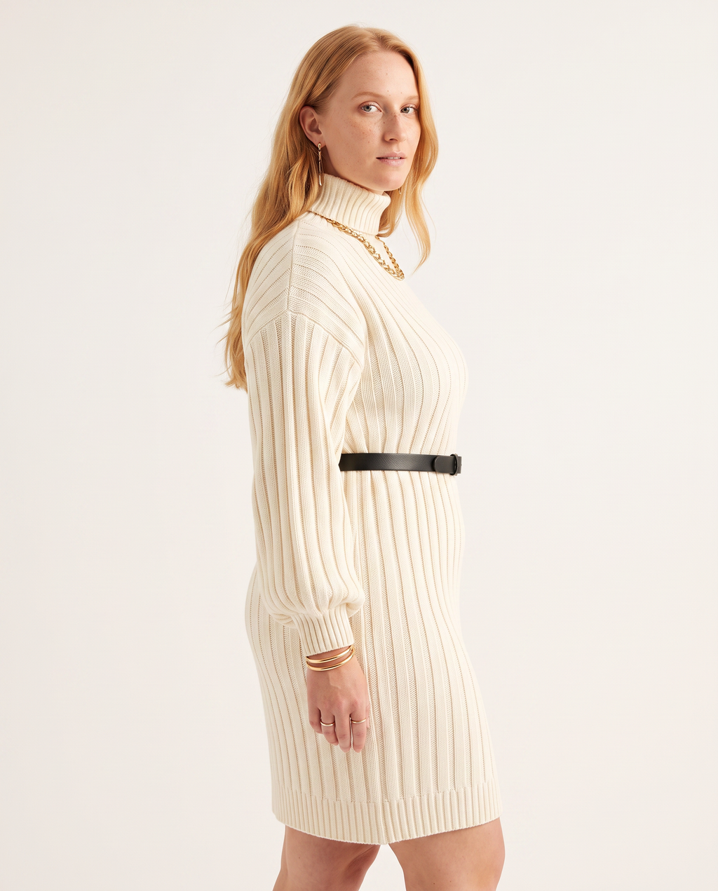 Belted Rib Knit Dress — three-quarter view, on a soft off-white studio backdrop