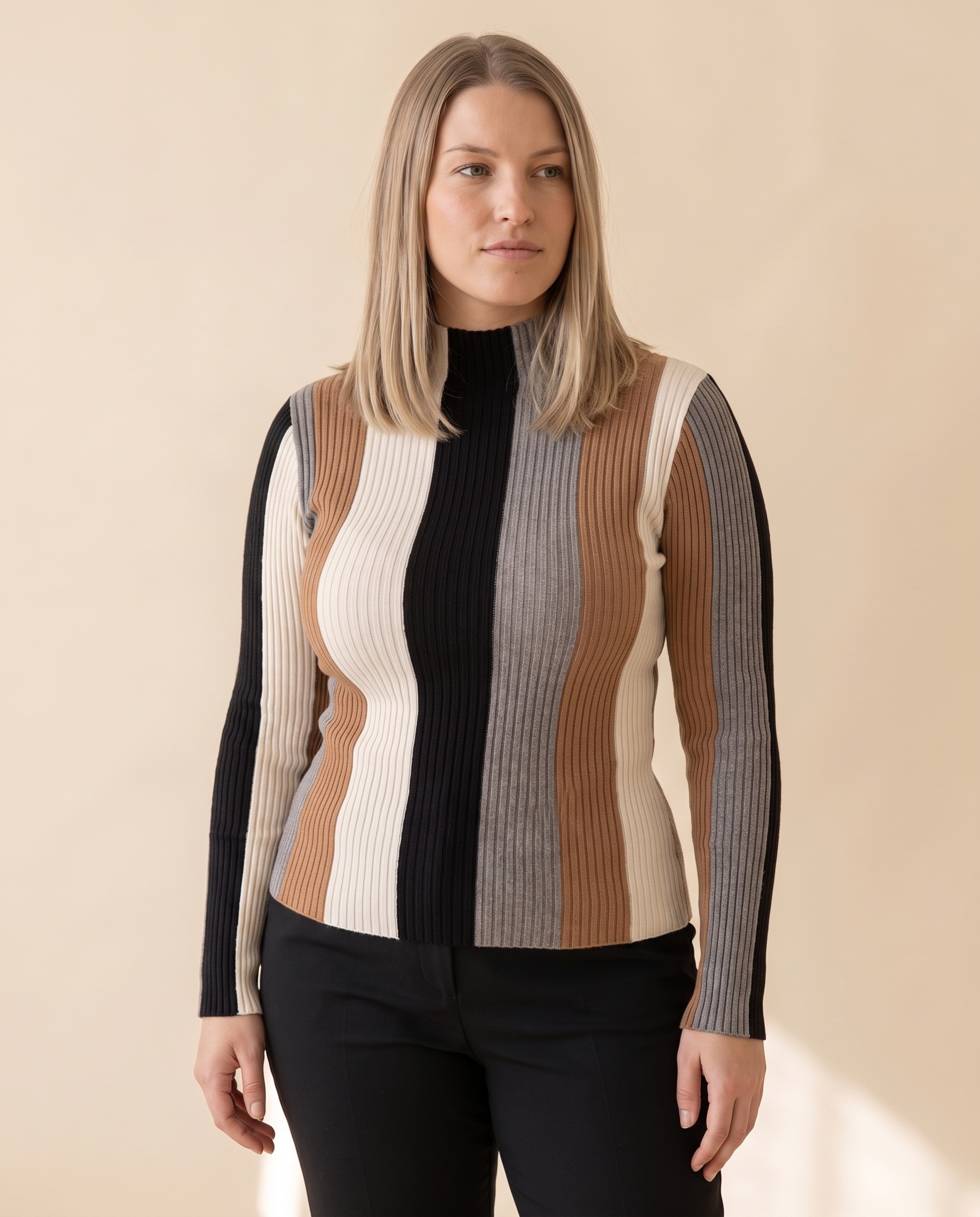 Vertical Stripe Rib Top on a pale sand studio backdrop
