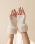 Fleece Cuff Fingerless Gloves on a pale sand studio backdrop