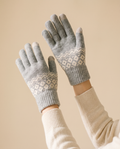 Fair Isle Touchscreen Gloves on a pale sand studio backdrop