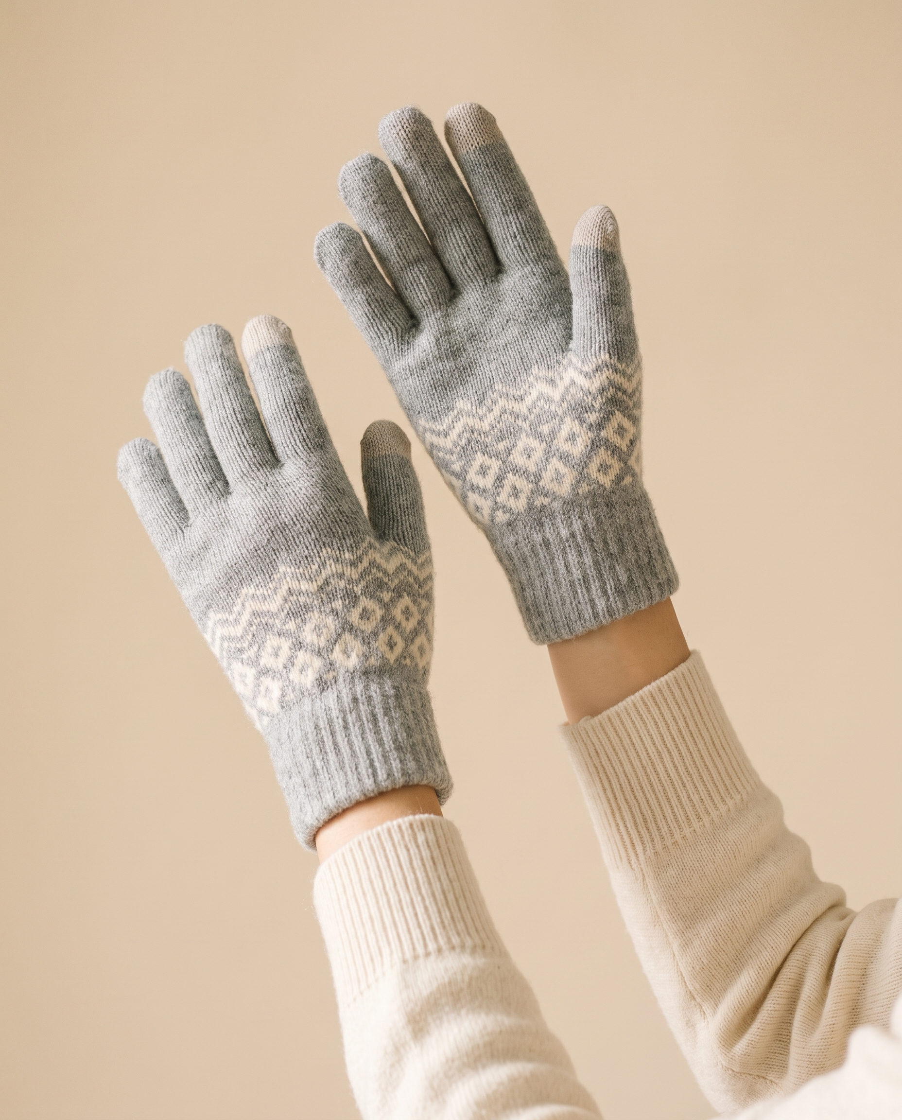 Fair Isle Touchscreen Gloves on a pale sand studio backdrop
